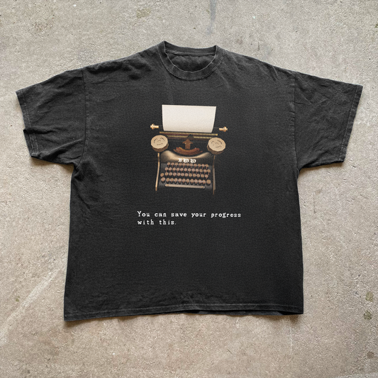 'TYPEWRITERS SAVE PROGRESS' RES. EVIL BLACK VINTAGE WASHED TEE